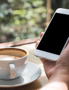 cell phone, coffee cup