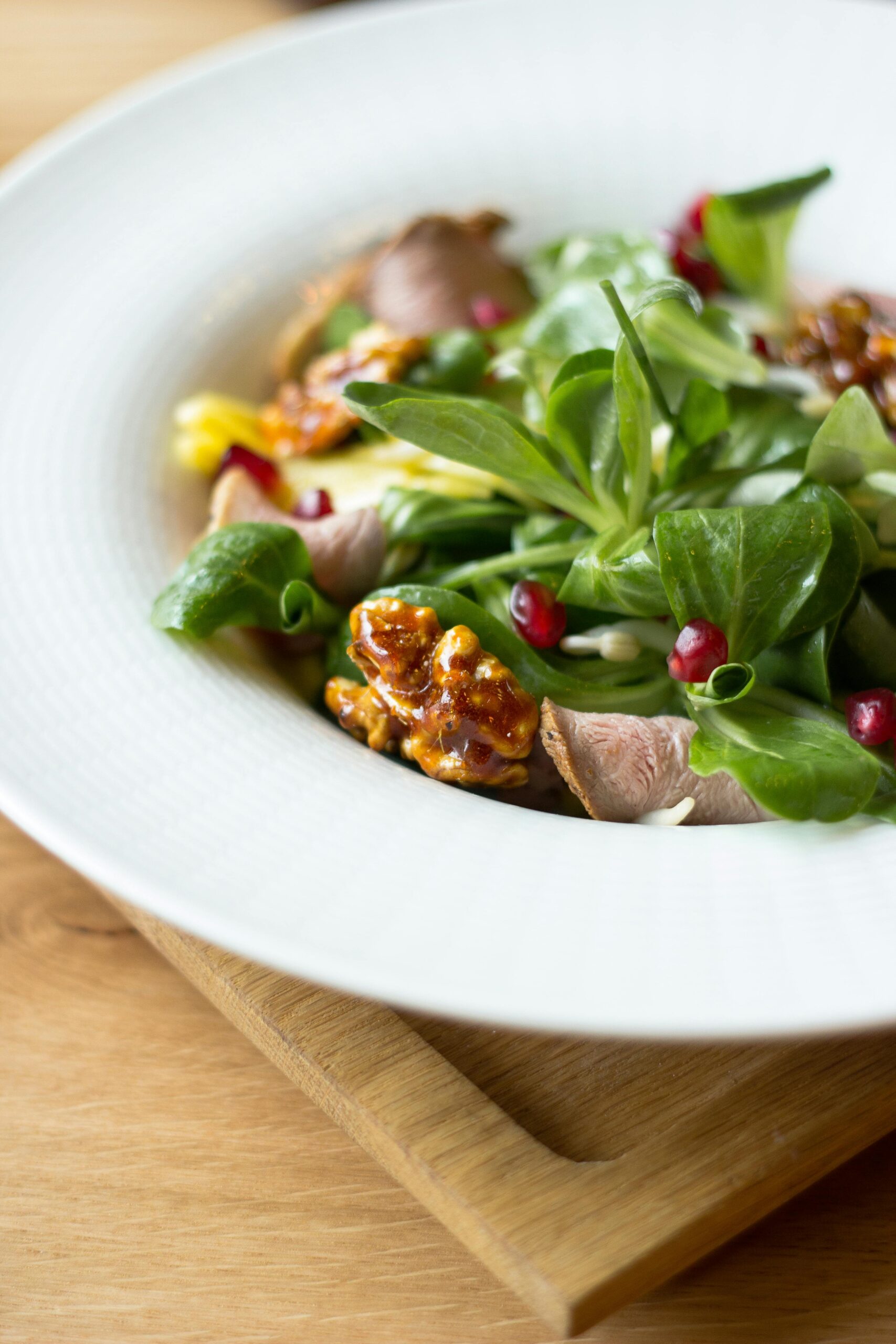 healthy green salad, nuts