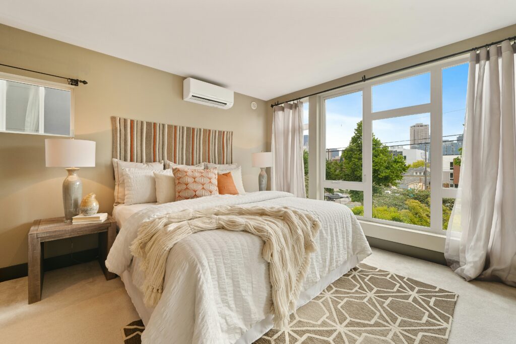 a cozy and serene, neutral bedroom