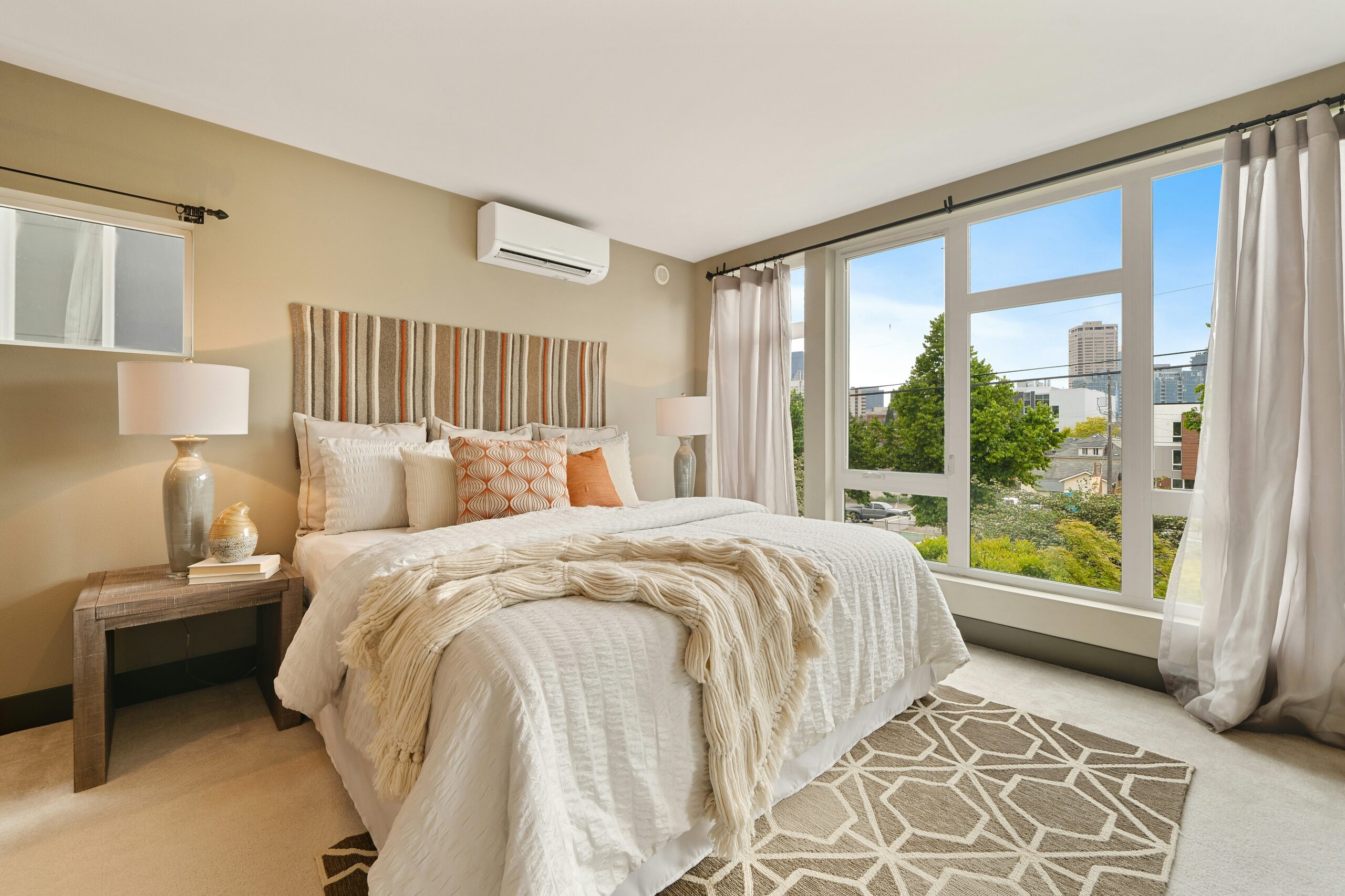 a cozy and serene, neutral bedroom