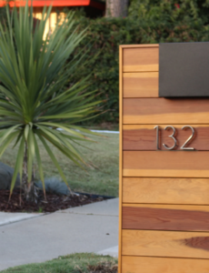 beautiful black metal and wood mailbox