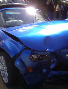 blue sports car, accident
