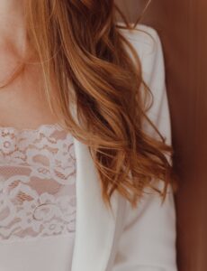 woman, auburn, wavy hair