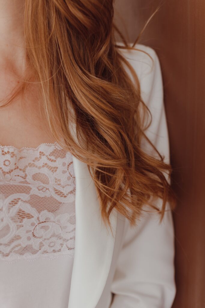Auburn, wavy hair