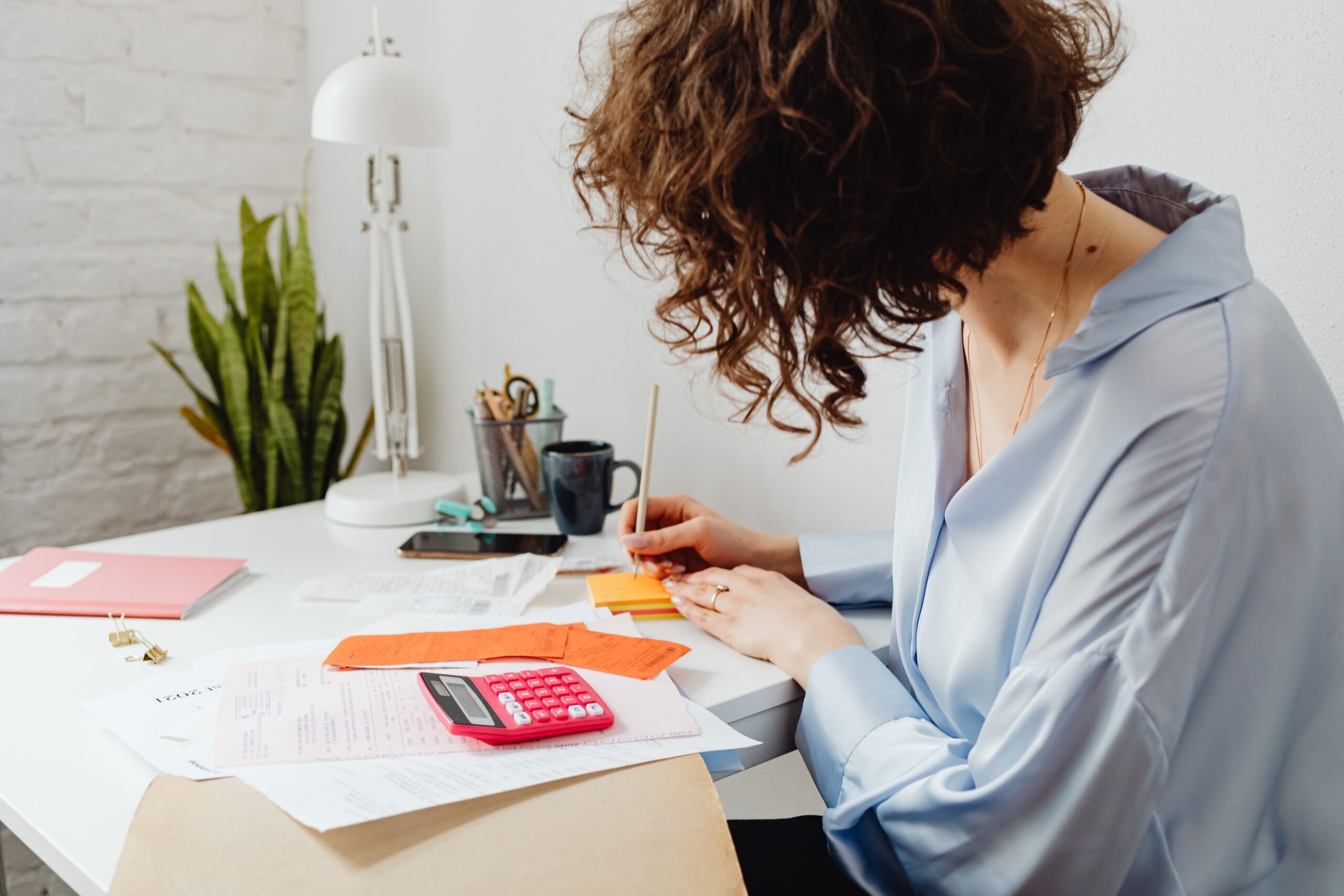woman computing personal finances