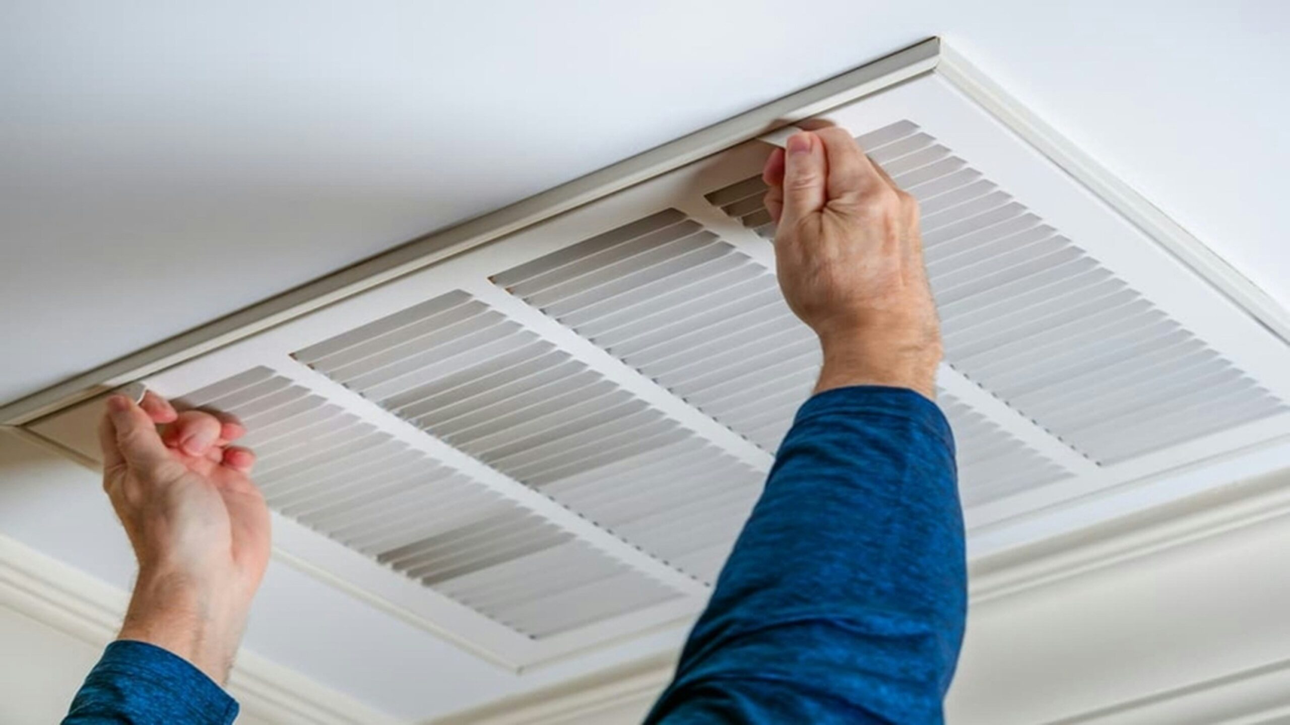 removing a ceiling air duct cover