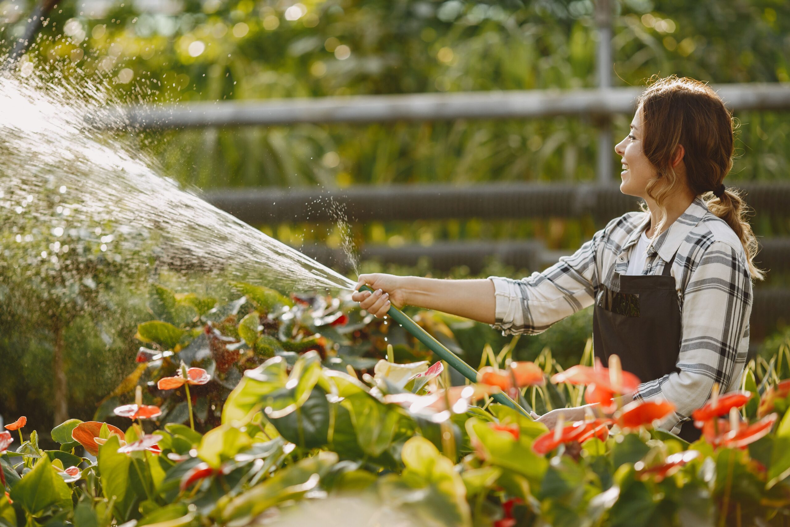 woman watering her garden