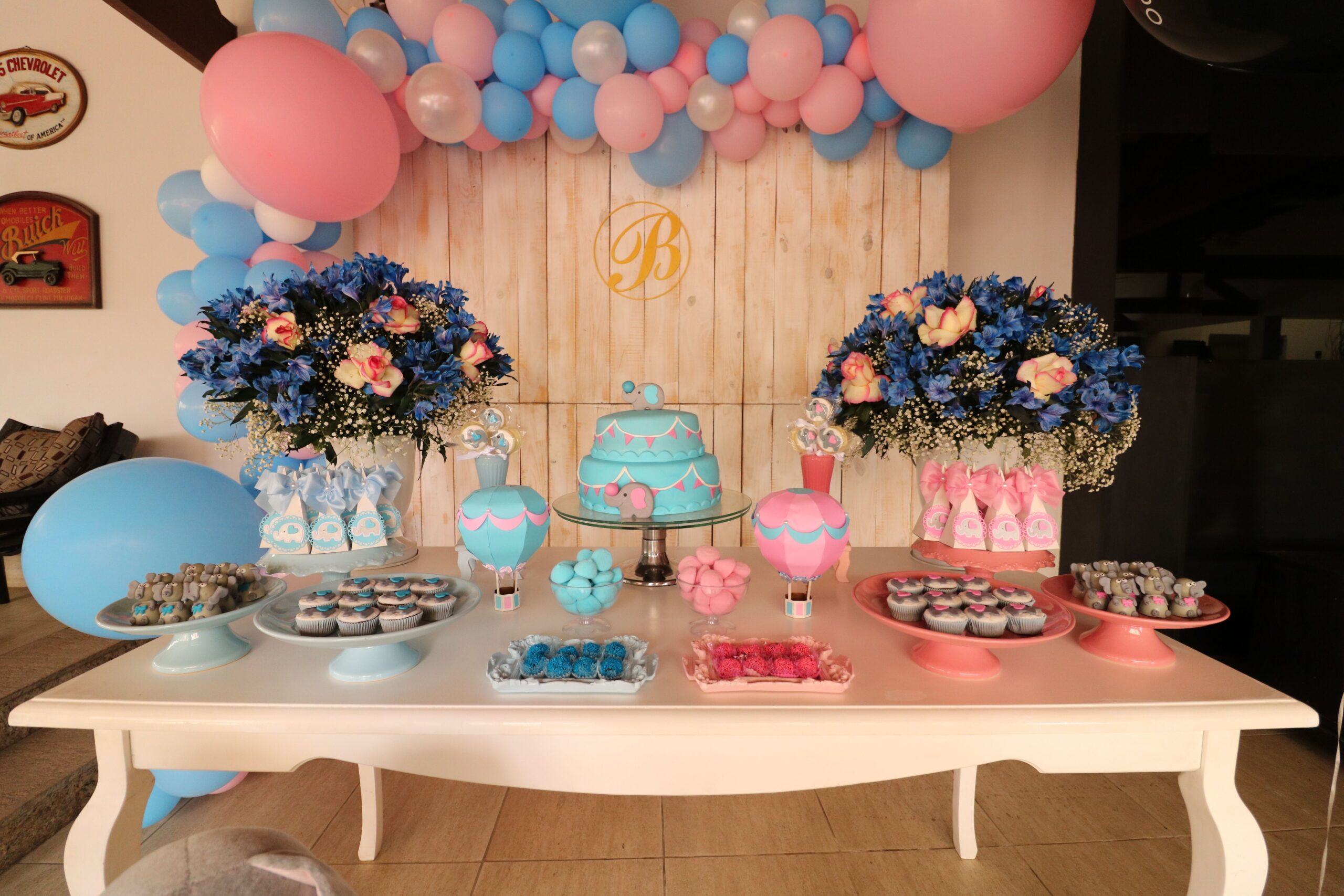 Baby shower dessert table party setup.