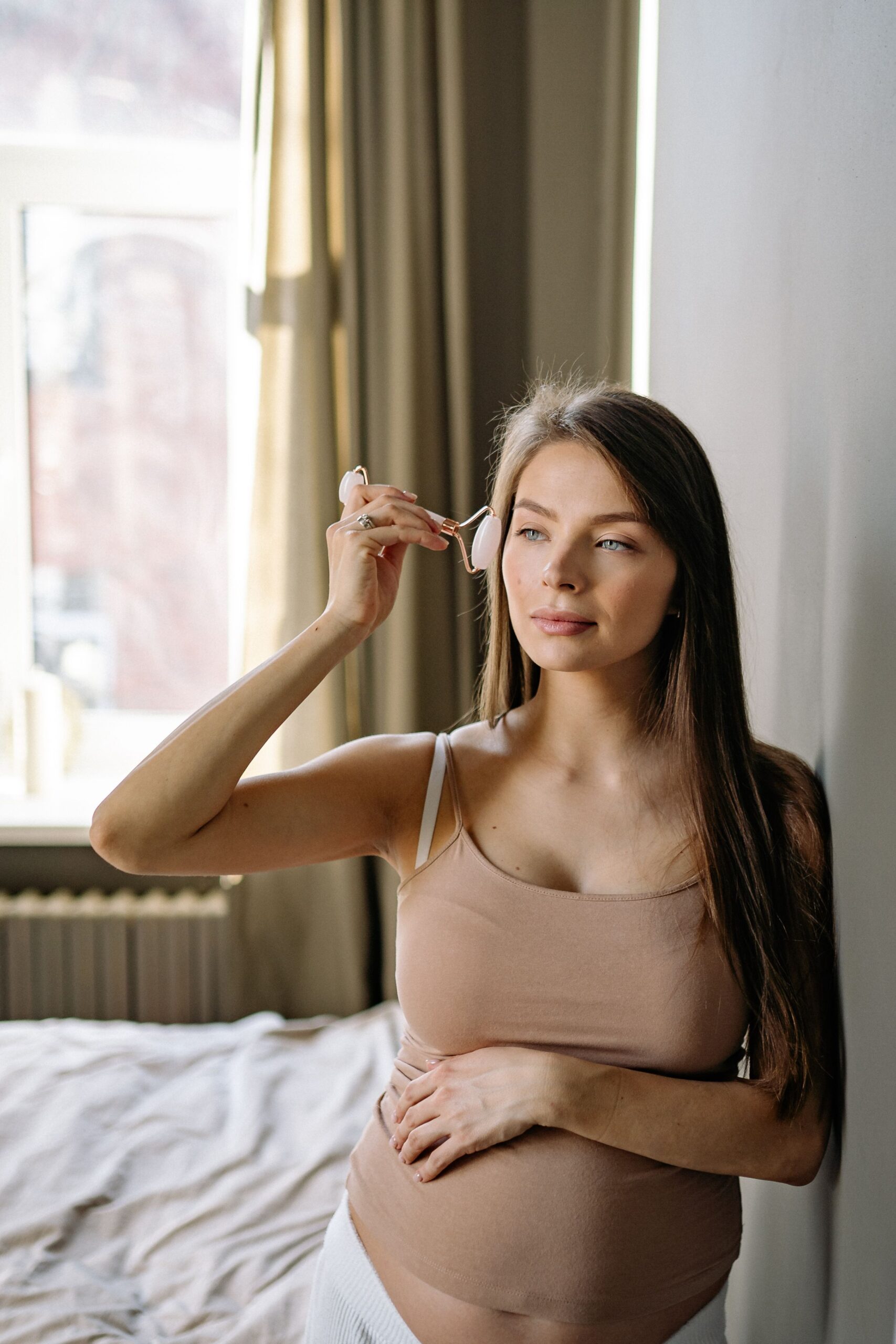 pregnant woman, face roller
