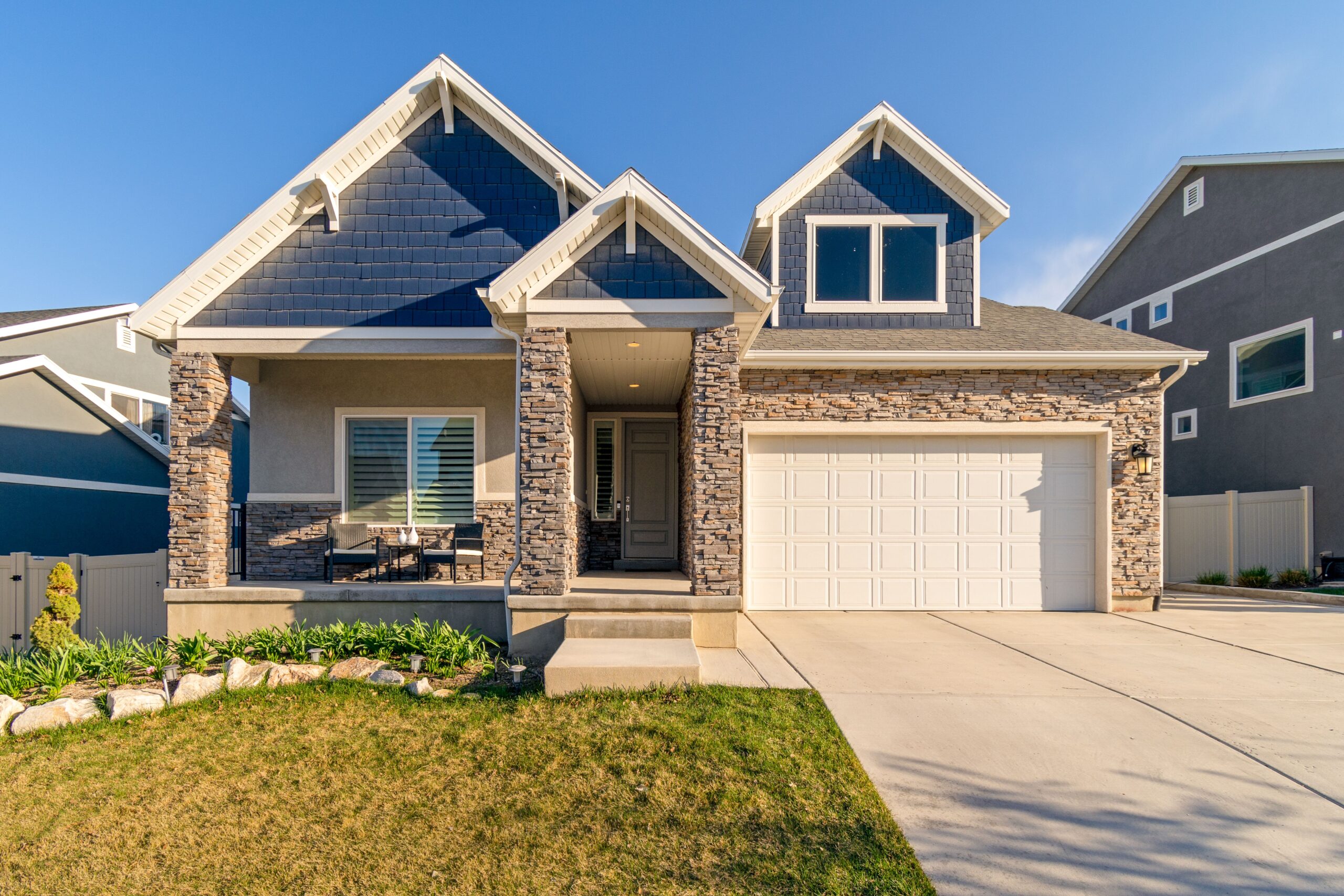 a beautiful suburban home with a driveway