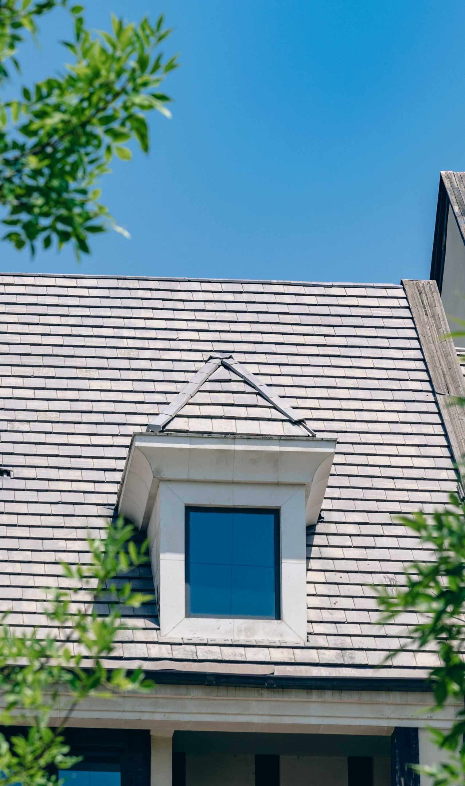 a pitched roof with shingles