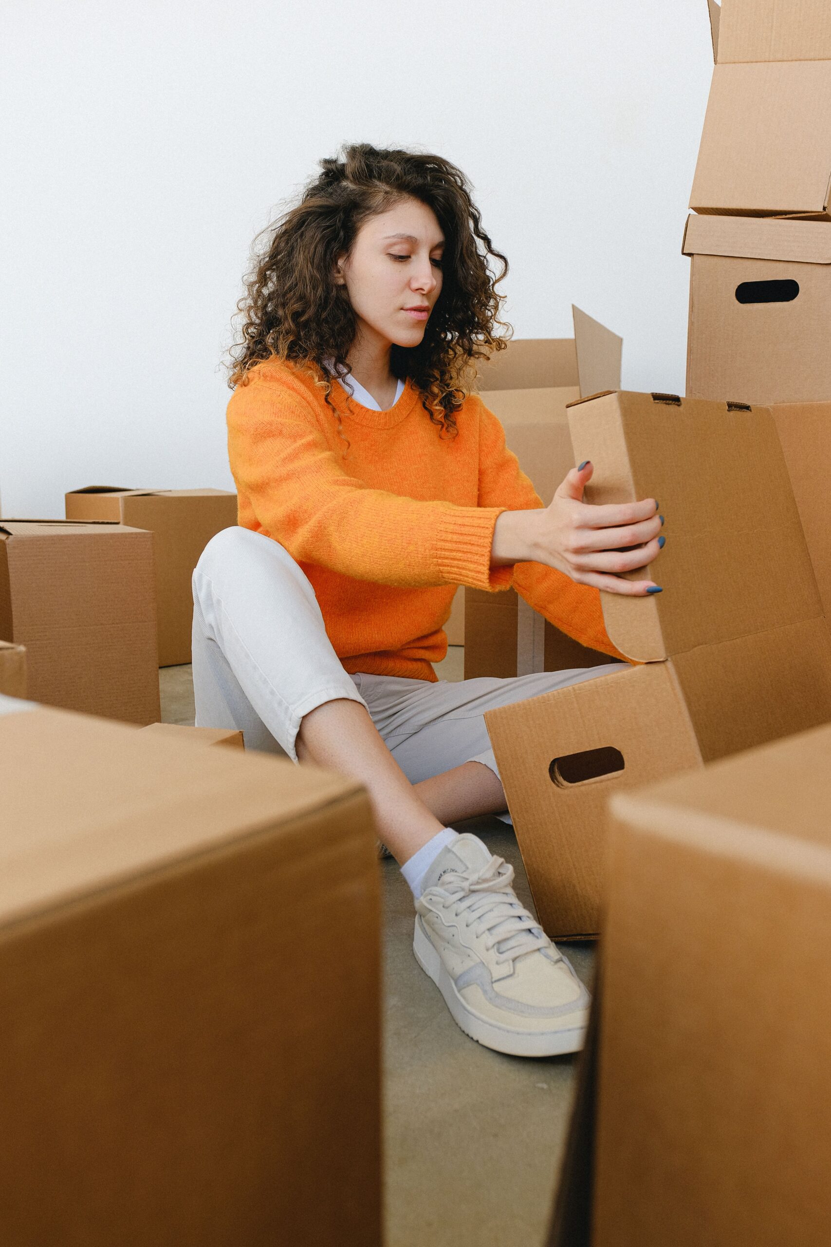woman, packing boxes